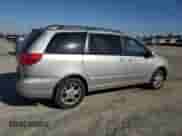 2004 Toyota Sienna XLE z VIN 5TDBA22C94S012496, wystawiony jako Copart lot #80386005 z przebiegiem 180 370 mil mil oraz Szkoda całkowita • Salvage title. Historia ofert i sprzedaży dostępna na DreamBid. Obrazek 3.