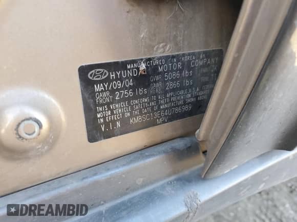 2004 Hyundai Santa Fe GLS z VIN KM8SC13E64U786989, wystawiony jako Copart lot #86345804 z przebiegiem 168 016 mil mil oraz Szkoda całkowita • Salvage title. Historia ofert i sprzedaży dostępna na DreamBid. Obrazek 12.