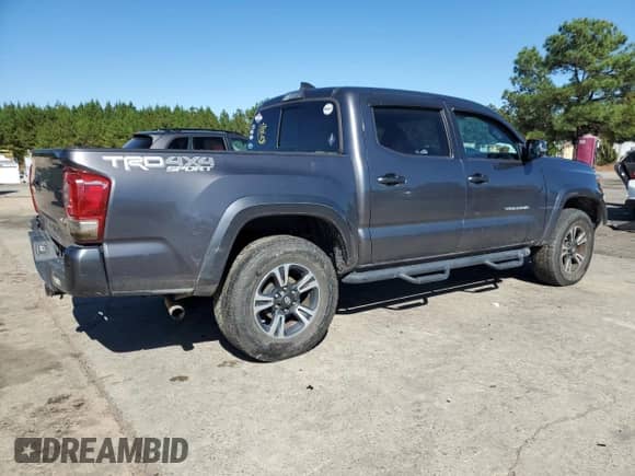 2017 Toyota Tacoma SR5 with VIN 5TFCZ5AN1HX071883, listed as a Copart auction lot 87033555 with 211,603 mi miles and Salvage title. Bid and sale history available at DreamBid. Image 3.