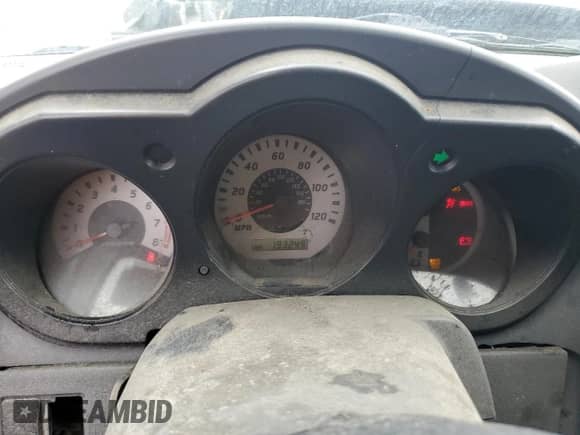 2004 Nissan Frontier XE z VIN 1N6ED29Y24C409987, wystawiony jako Copart lot #69948344 z przebiegiem 193 245 mil mil oraz Szkoda całkowita • Salvage title. Historia ofert i sprzedaży dostępna na DreamBid. Obrazek 9.