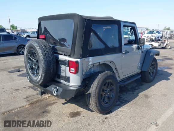 2015 Jeep Wrangler Sport with VIN 1C4AJWAG0FL773008, listed as a IAAI auction lot 42422112 with 88,370 mi miles and . Bid and sale history available at DreamBid. Image 4.