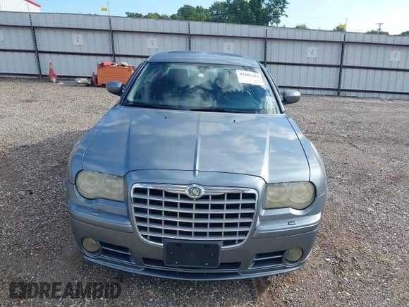 2006 Chrysler 300 C SRT-8 with VIN 2C3LA73W66H523504, listed as a IAAI auction lot 42483103 with 61,560 mi miles and . Bid and sale history available at DreamBid. Image 6.