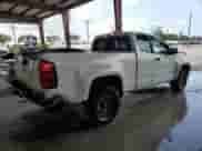 2018 Chevrolet Colorado 2WD Work Truck with VIN 1GCHSBEA7J1191759, listed as a Copart auction lot 61990805 with 123,334 mi miles and Salvage title. Bid and sale history available at DreamBid. Image 3.