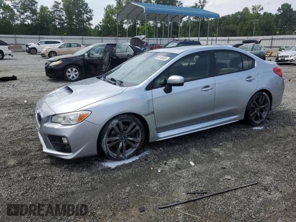 2017 Subaru WRX Premium with VIN JF1VA1E60H8814044, listed as a Copart auction lot 60159555 with 112,395 mi miles and Salvage title. Bid and sale history available at DreamBid. Image 1.