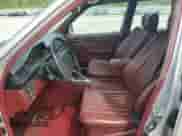 1989 Mercedes-Benz 300 E with VIN WDBEA30D7KA942808, listed as a Copart auction lot 59315945 with 121,727 mi miles and Clean title. Bid and sale history available at DreamBid. Image 7.