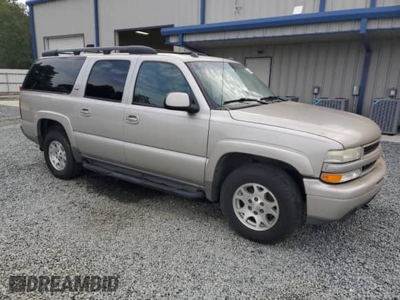 2005 Chevrolet Suburban LS z VIN 3GNFK16Z45G101746, wystawiony jako Copart lot #63064944 z przebiegiem 316 465 mil mil oraz Czysty tytuł • Clean title. Historia ofert i sprzedaży dostępna na DreamBid. Obrazek 4.