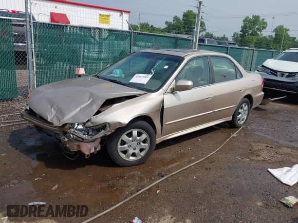 2002 Honda Accord EX с VIN 1HGCG55652A102699, выставлен на аукционе IAAI как лот 42467009 с пробегом 161 252 миль миль и . История ставок и продаж доступна на DreamBid. Изображение 2.