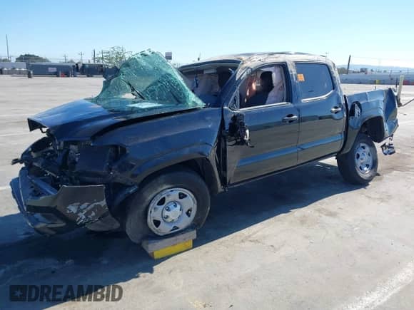2022 Toyota Tacoma SR with VIN 3TYAX5GNXNT053716, listed as a IAAI auction lot 42853297 with 42,989 mi miles and . Bid and sale history available at DreamBid. Image 2.
