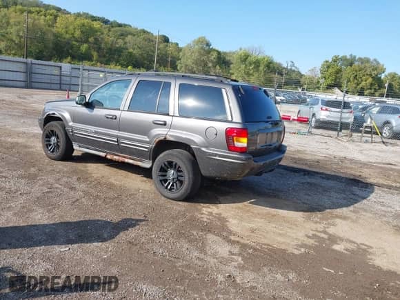 2002 Jeep Grand Cherokee Overland with VIN 1J8GW68J92C172096, listed as a IAAI auction lot 43437807 with 201,882 mi miles and . Bid and sale history available at DreamBid. Image 3.