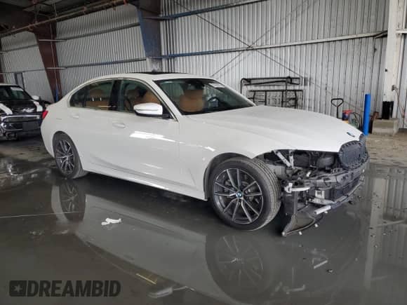 2019 BMW 3 Series 330i with VIN WBA5R1C54KAK12564, listed as a Copart auction lot 87452615 with 49,169 mi miles and Salvage title. Bid and sale history available at DreamBid. Image 4.