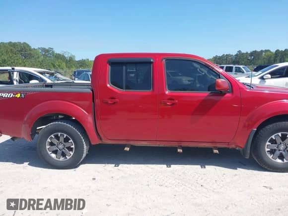 2014 Nissan Frontier S with VIN 1N6AD0EV3EN734085, listed as a IAAI auction lot 42007200 with Not provided miles and . Bid and sale history available at DreamBid. Image 12.