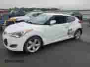 2013 Hyundai Veloster w/Black Int z VIN KMHTC6AD6DU180586, wystawiony jako Copart lot #81717425 z przebiegiem 91 070 mil mil oraz Szkoda całkowita • Salvage title. Historia ofert i sprzedaży dostępna na DreamBid. Obrazek 1.