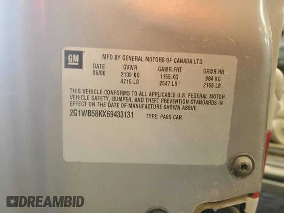 2006 Chevrolet Impala LS z VIN 2G1WB58KX69433131, wystawiony jako Copart lot #69977335 z przebiegiem 146 195 mil mil oraz Szkoda całkowita • Salvage title. Historia ofert i sprzedaży dostępna na DreamBid. Obrazek 12.