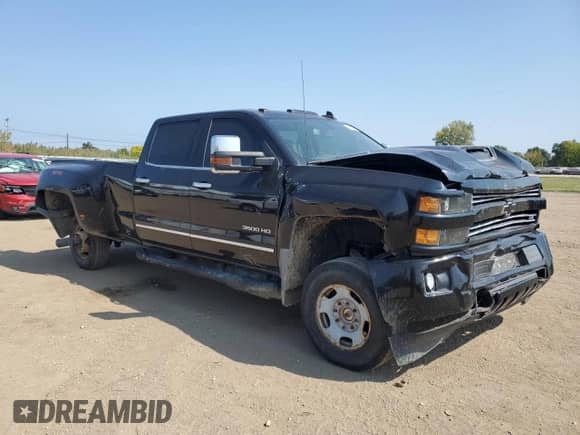 2018 Chevrolet Silverado 3500HD LTZ с VIN 1GC4K0CY8JF164740, выставлен на аукционе Copart как лот 81114255 с пробегом 182 648 миль миль и Списание • Salvage title. История ставок и продаж доступна на DreamBid. Изображение 4.