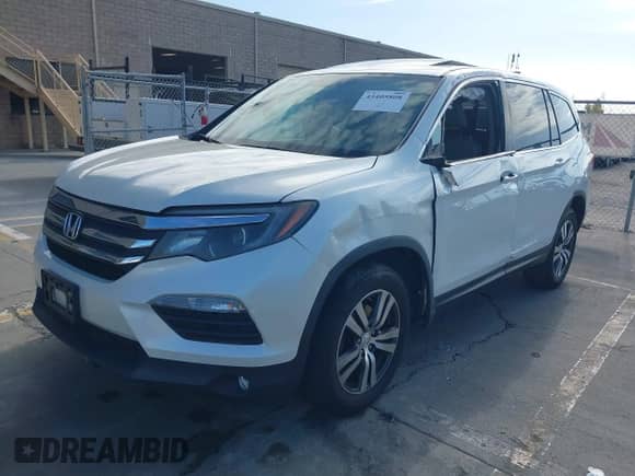 2017 Honda Pilot EX-L with VIN 5FNYF5H5XHB007405, listed as a IAAI auction lot 43405808 with 94,970 mi miles and . Bid and sale history available at DreamBid. Image 2.