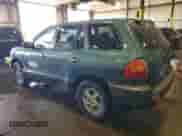 2002 Hyundai Santa Fe GLS z VIN KM8SC13D82U337771, wystawiony jako Copart lot #55555785 z przebiegiem 84 665 mil mil oraz Szkoda całkowita • Salvage title. Historia ofert i sprzedaży dostępna na DreamBid. Obrazek 2.