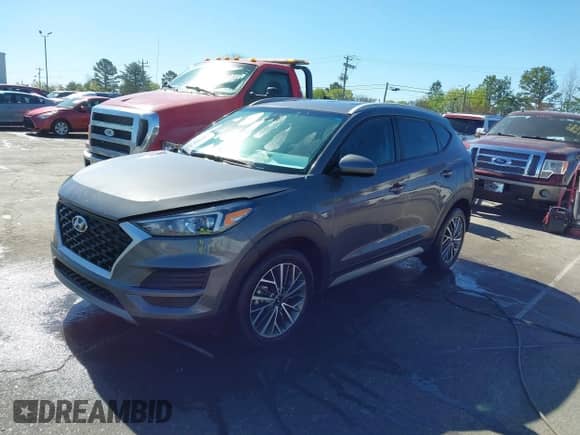 2021 Hyundai Tucson SEL with VIN KM8J33AL7MU325387, listed as a IAAI auction lot 41817205 with 19,969 mi miles and . Bid and sale history available at DreamBid. Image 2.
