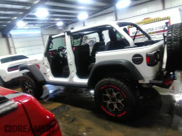 2021 Jeep Wrangler Unlimited Rubicon with VIN 1C4HJXFN9MW779882, listed as a IAAI auction lot 37264183 with 36,314 mi miles and . Bid and sale history available at DreamBid. Image 14.