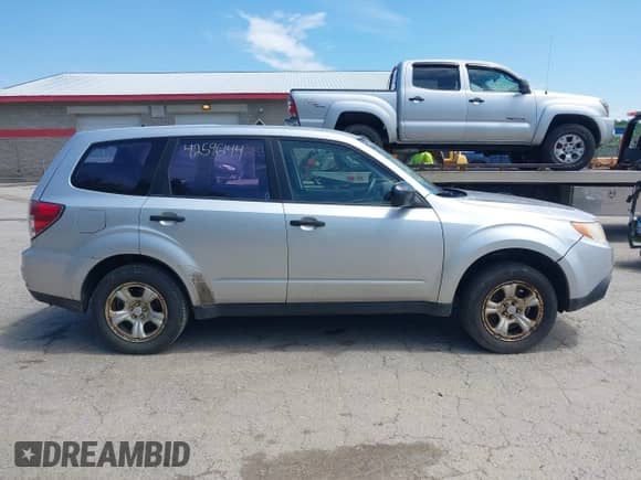 2010 Subaru Forester X with VIN JF2SH6AC3AG741539, listed as a IAAI auction lot 42596144 with 189,774 mi miles and . Bid and sale history available at DreamBid. Image 14.