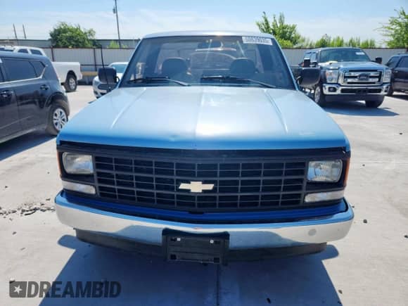 1988 Chevrolet Silverado 1500 с VIN 1GCDC14Z6JZ310710, выставлен на аукционе Copart как лот 60839035 с пробегом 41 миль миль и Чистый • Clean title. История ставок и продаж доступна на DreamBid. Изображение 5.