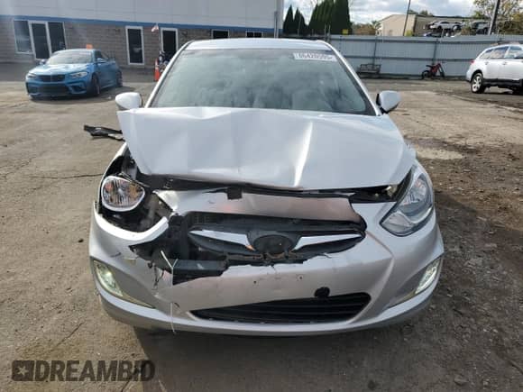 2014 Hyundai Accent GLS z VIN KMHCT4AE5EU703823, wystawiony jako Copart lot #86420595 z przebiegiem 132 910 mil mil oraz Szkoda całkowita • Salvage title. Historia ofert i sprzedaży dostępna na DreamBid. Obrazek 5.