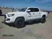 2020 Toyota Tacoma SR5 с VIN 3TMAZ5CN0LM120428, выставлен на аукционе Copart как лот 69748535 с пробегом 147 306 миль миль и Списание • Salvage title. История ставок и продаж доступна на DreamBid. Изображение 1.