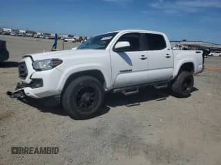 2020 Toyota Tacoma SR5 with VIN 3TMAZ5CN0LM120428, listed as a Copart auction lot 69748535 with 147,306 mi miles and Salvage title. Bid and sale history available at DreamBid. Image 1.