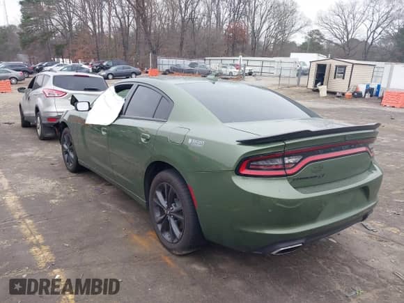 2023 Dodge Charger SXT with VIN 2C3CDXJG1PH657695, listed as a IAAI auction lot 41199974 with 26,013 mi miles and . Bid and sale history available at DreamBid. Image 3.