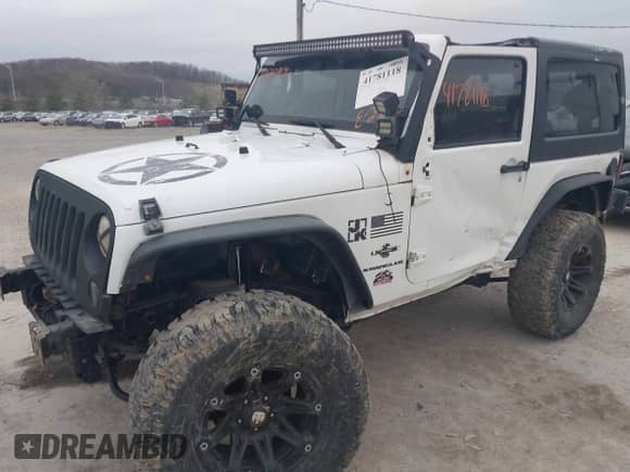 2012 Jeep Wrangler Sport с VIN 1C4AJWAG0CL289478, выставлен на аукционе IAAI как лот 41781118 с пробегом 127 299 миль миль и . История ставок и продаж доступна на DreamBid. Изображение 6.
