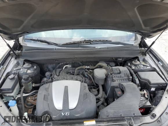 2011 Hyundai Santa Fe GLS z VIN 5XYZGDAG9BG059020, wystawiony jako Copart lot #55920415 z przebiegiem 167 815 mil mil oraz Szkoda całkowita • Salvage title. Historia ofert i sprzedaży dostępna na DreamBid. Obrazek 12.