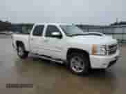 2012 Chevrolet Silverado 1500 LTZ with VIN 3GCPCTE0XCG186727, listed as a Copart auction lot 84007604 with 242,722 mi miles and Clean title. Bid and sale history available at DreamBid. Image 4.