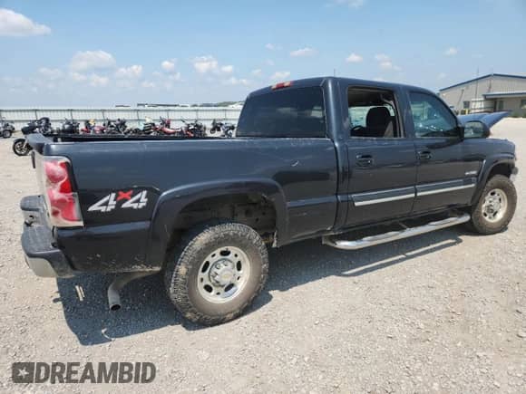 2004 Chevrolet Silverado 2500 LS z VIN 1GCGK23U04F104977, wystawiony jako Copart lot #66474245 z przebiegiem Nie podano mil oraz Szkoda całkowita • Salvage title. Historia ofert i sprzedaży dostępna na DreamBid. Obrazek 3.
