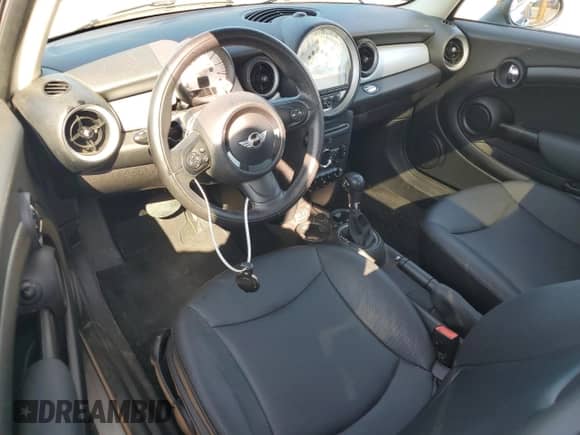 2013 MINI Hardtop with VIN WMWSU3C59DT678236, listed as a Copart auction lot 81742935 with 124,785 mi miles and Salvage title. Bid and sale history available at DreamBid. Image 8.