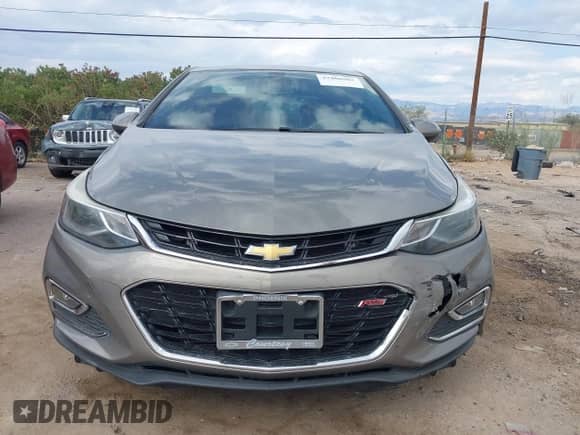 2017 Chevrolet Cruze LT z VIN 1G1BE5SMXH7215310, wystawiony jako IAAI lot #43400905 z przebiegiem 129 073 mil mil oraz . Historia ofert i sprzedaży dostępna na DreamBid. Obrazek 12.