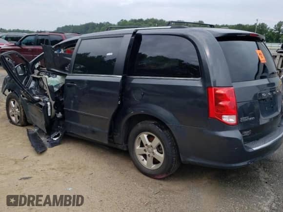 2011 Dodge Grand Caravan Crew with VIN 2D4RN5DG9BR647862, listed as a Copart auction lot 54983173 with Not provided miles and Salvage title. Bid and sale history available at DreamBid. Image 2.