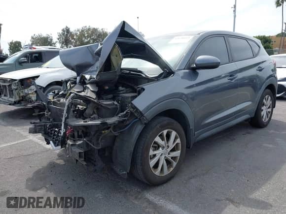 2019 Hyundai Tucson SE z VIN KM8J23A49KU969885, wystawiony jako IAAI lot #43230165 z przebiegiem 165 610 mil mil oraz . Historia ofert i sprzedaży dostępna na DreamBid. Obrazek 17.