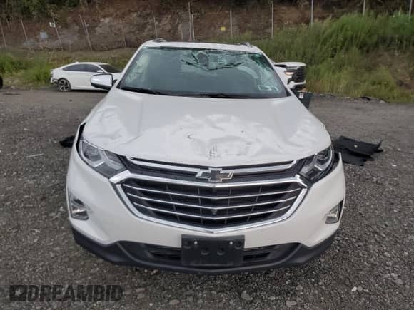 2020 Chevrolet Equinox Premier с VIN 3GNAXYEX9LS665844, выставлен на аукционе Copart как лот 68512015 с пробегом 16 080 миль миль и Списание • Salvage title. История ставок и продаж доступна на DreamBid. Изображение 5.