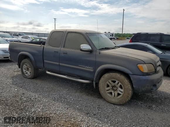 2004 Toyota Tundra SR5 z VIN 5TBBT44114S448219, wystawiony jako Copart lot #56860455 z przebiegiem Nie podano mil oraz Szkoda całkowita • Salvage title. Historia ofert i sprzedaży dostępna na DreamBid. Obrazek 4.