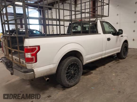 2019 Ford F-150 XL with VIN 1FTMF1C53KKE18847, listed as a IAAI auction lot 41526344 with 184,942 mi miles and . Bid and sale history available at DreamBid. Image 4.