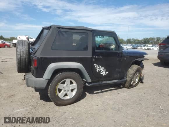 2010 Jeep Wrangler Sport с VIN 1J4AA2D13AL111104, выставлен на аукционе Copart как лот 84287605 с пробегом 110 407 миль миль и Списание • Salvage title. История ставок и продаж доступна на DreamBid. Изображение 3.