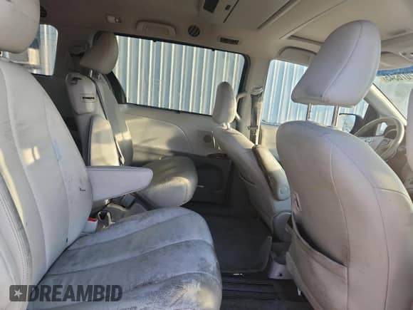 2014 Toyota Sienna XLE с VIN 5TDYK3DC9ES465951, выставлен на аукционе Copart как лот 82076345 с пробегом 251 483 миль миль и Списание • Salvage title. История ставок и продаж доступна на DreamBid. Изображение 11.