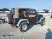1997 Jeep Wrangler SE z VIN 1J4FY29PXVP437267, wystawiony jako Copart lot #69390955 z przebiegiem 151 349 mil mil oraz Czysty tytuł • Clean title. Historia ofert i sprzedaży dostępna na DreamBid. Obrazek 3.