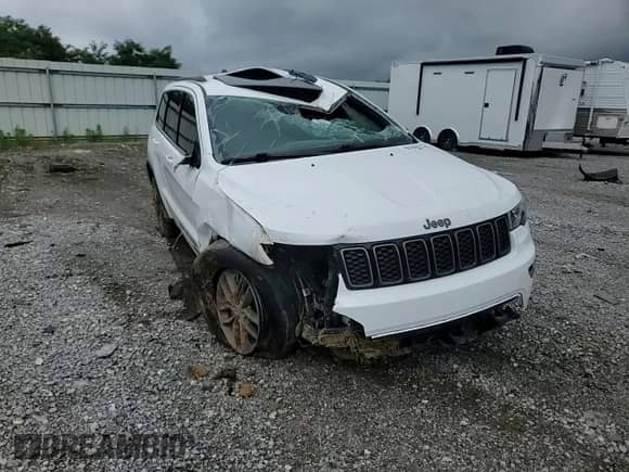 2016 Jeep Grand Cherokee 75th Anniversary with VIN 1C4RJEAG5GC457697, listed as a Copart auction lot 61092745 with 141,488 mi miles and Salvage title. Bid and sale history available at DreamBid. Image 14.
