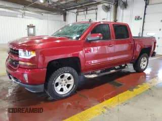 2018 Chevrolet Silverado 1500 LT with VIN 3GCUKREC1JG269270, listed as a Copart auction lot 65633135 with 101,829 mi miles and Salvage title. Bid and sale history available at DreamBid. Image 1.