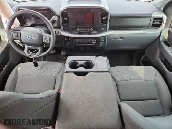 2023 Ford F-150 Lariat with VIN 1FTFW1E89PFA91516, listed as a Copart auction lot 61666315 with 65,711 mi miles and Salvage title. Bid and sale history available at DreamBid. Image 8.