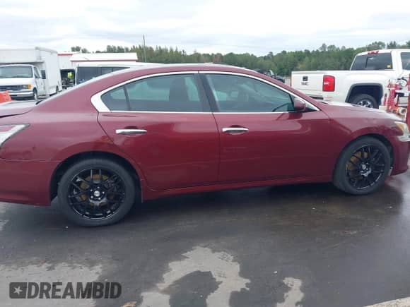 2012 Nissan Maxima SV z VIN 1N4AA5APXCC861575, wystawiony jako IAAI lot #43434505 z przebiegiem 121 313 mil mil oraz . Historia ofert i sprzedaży dostępna na DreamBid. Obrazek 13.