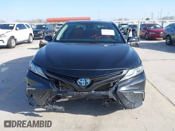 2022 Toyota Camry Hybrid XSE z VIN 4T1K31AK4NU579480, wystawiony jako IAAI lot #41709133 z przebiegiem 66 968 mil mil oraz . Historia ofert i sprzedaży dostępna na DreamBid. Obrazek 13.