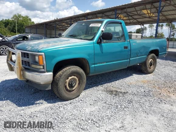 1994 Chevrolet Silverado 2500 с VIN 1GCFK24H4RE191910, выставлен на аукционе Copart как лот 65990304 с пробегом 287 181 миль миль и Списание • Salvage title. История ставок и продаж доступна на DreamBid. Изображение 1.