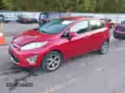 2012 Ford Fiesta SES with VIN 3FADP4FJ2CM196390, listed as a IAAI auction lot 43240588 with 142,304 mi miles and . Bid and sale history available at DreamBid. Image 2.