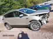 2017 Ford Escape Titanium with VIN 1FMCU9J95HUD42000, listed as a IAAI auction lot 43387558 with 122,185 mi miles and . Bid and sale history available at DreamBid. Image 14.